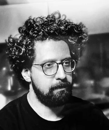 Black and white portrait of Amirhesam Monshi
