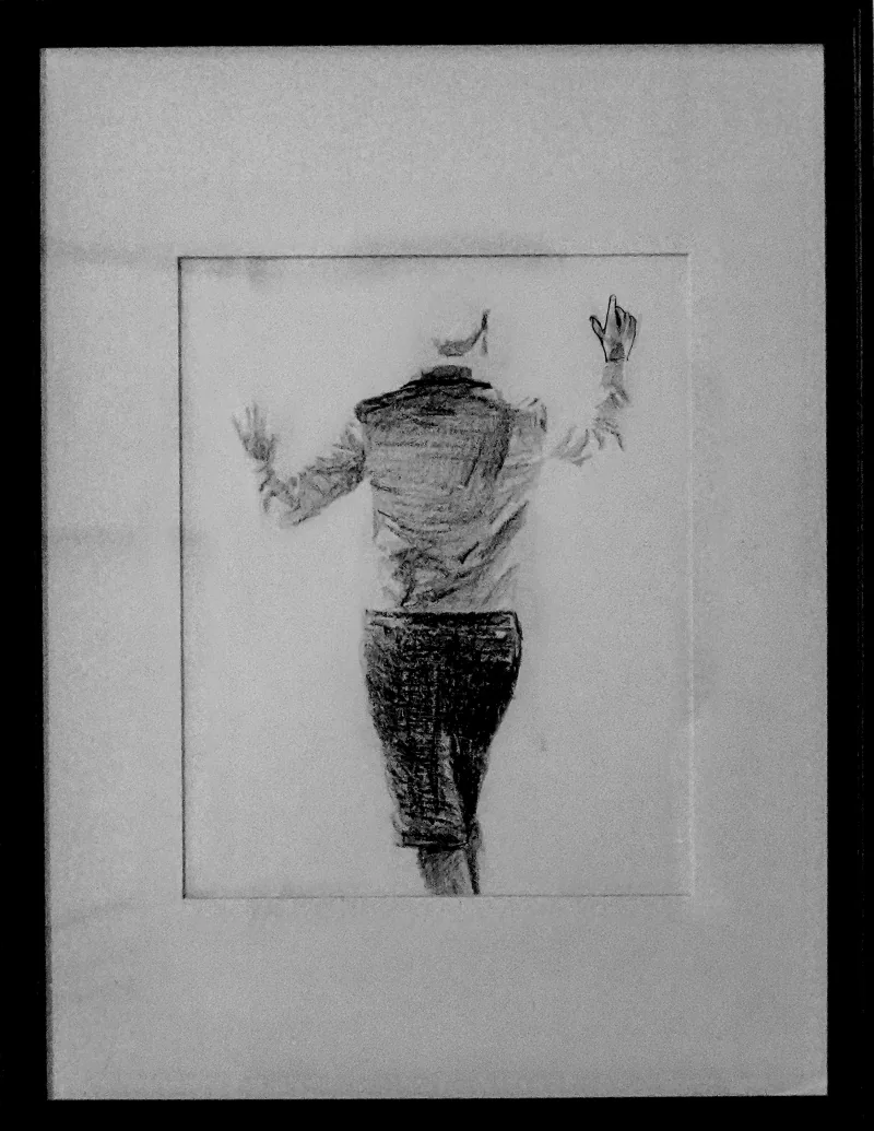 Framed pencil drawing of a human figure with an unravelled head